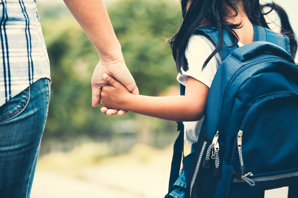 Working Together: Parents & Teachers as a Team! 🍎🤝✨ cute asian pupil girl with backpack holding her mother hand and going to school